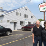 Louis and Becky Vecchio stand in front of Jimmie’s Place